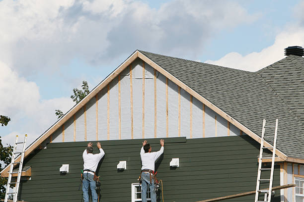 Professional Vinyl Siding technician working in North, VA